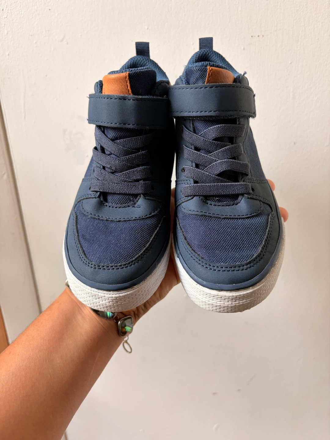 Children place shoes size 12