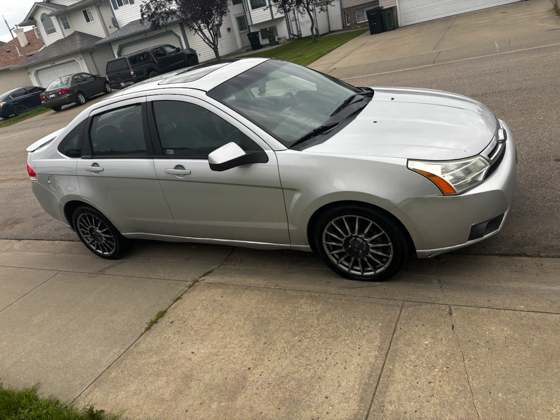 209 Silver Ford Focus Sedan