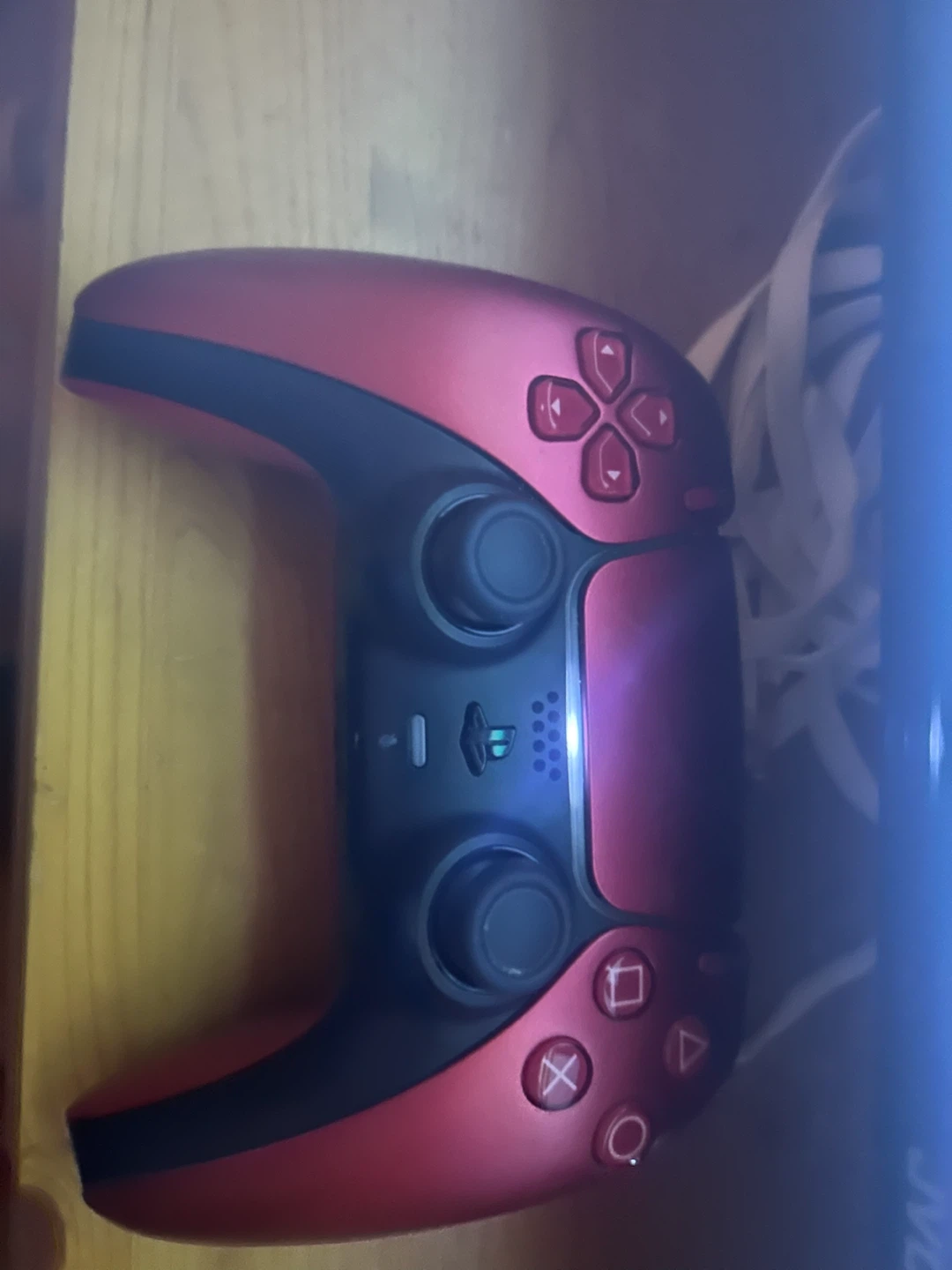 PlayStation 5 Console and Red DualSense Controller