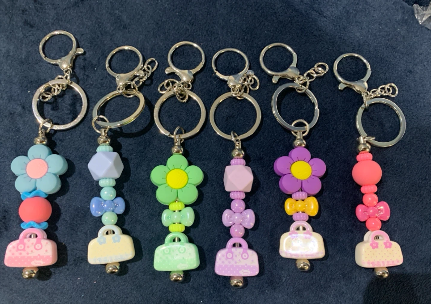 Cute Flower and Purse Keychains 10 dollars each