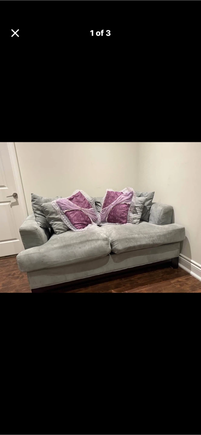 Light Blue Sofa with Pillows