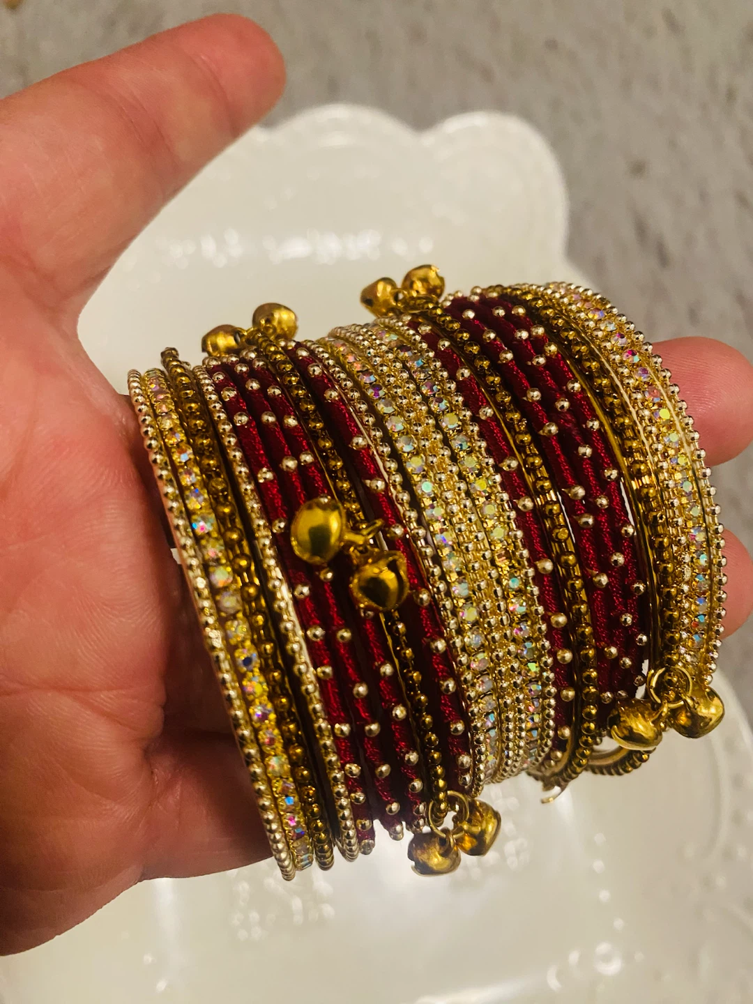 New (Unused) Set of 24 Maroon and Gold Bangles with Charms