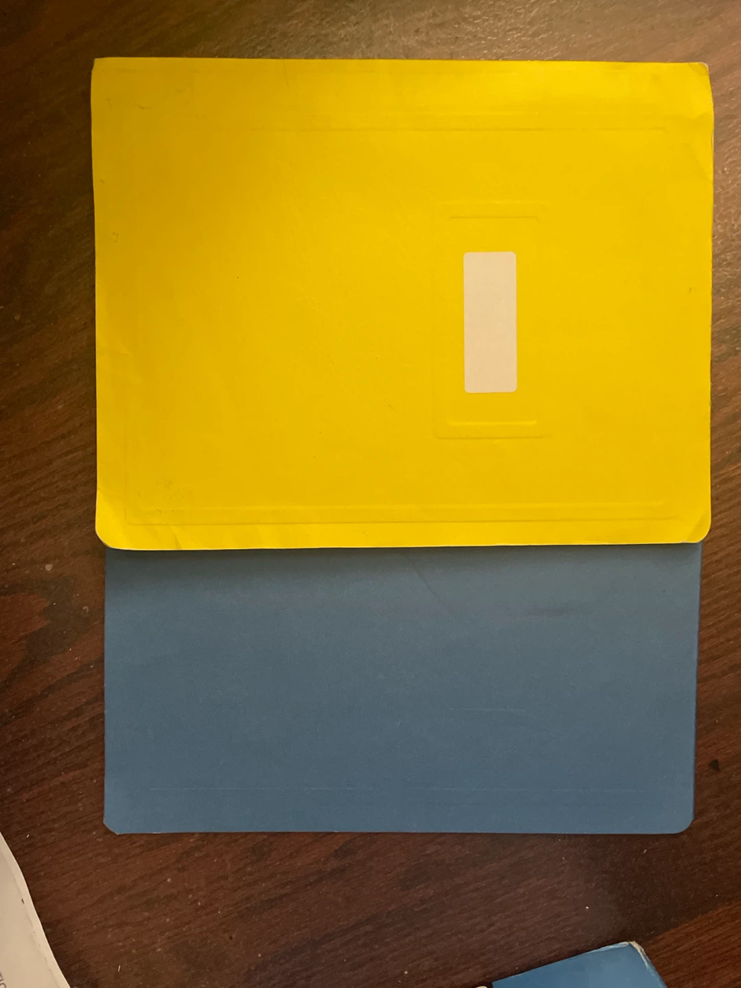 Yellow and Blue Plastic Hilroy Duotang – Good Condition