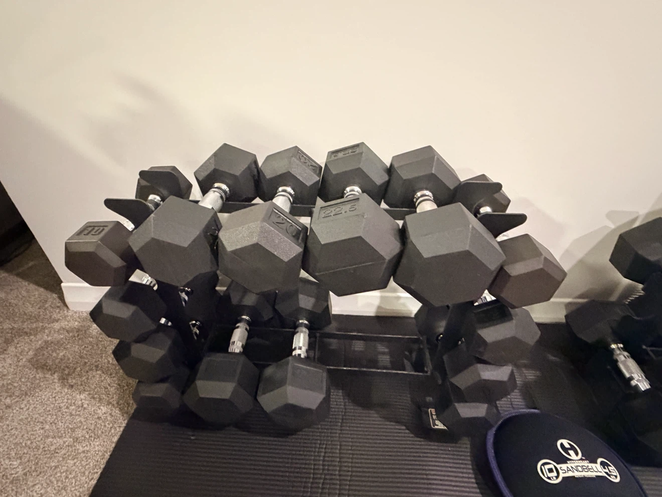 Complete Dumbbell Set with Metal Racks, Mat & Sandbag – Like New - photo 2