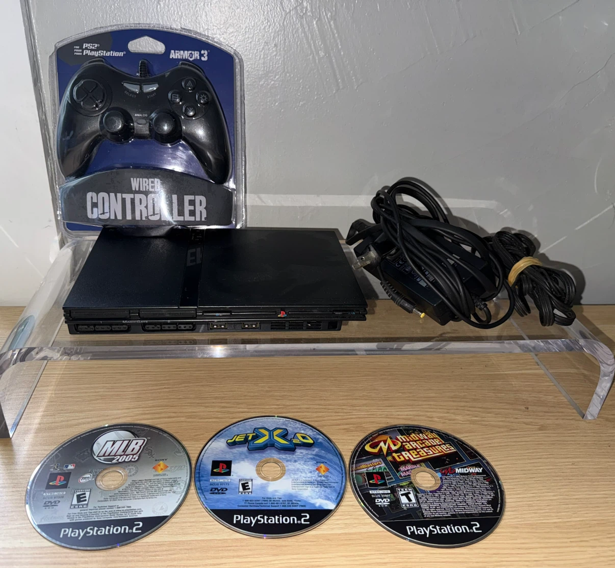 Slim PlayStation 2 Console with Controller and 3 Games