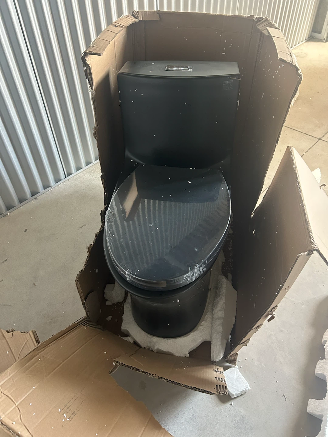 New Black one Piece Toilet It has a little chip on tank - photo 2