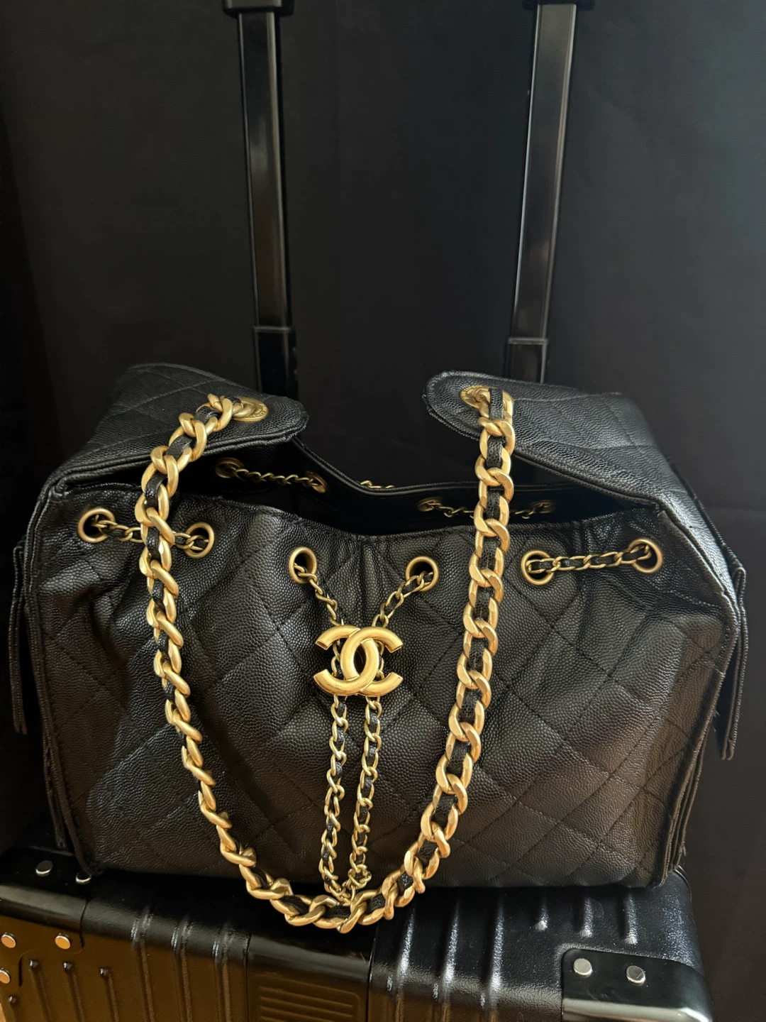 Chanel Quilted Black Caviar 25 ($250)