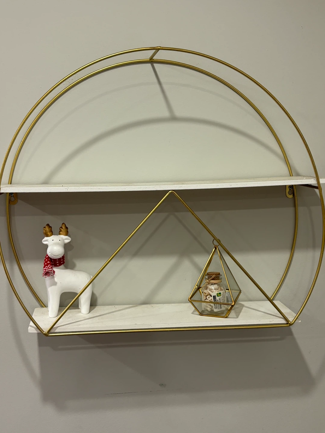 Golden geometric wall shelf
