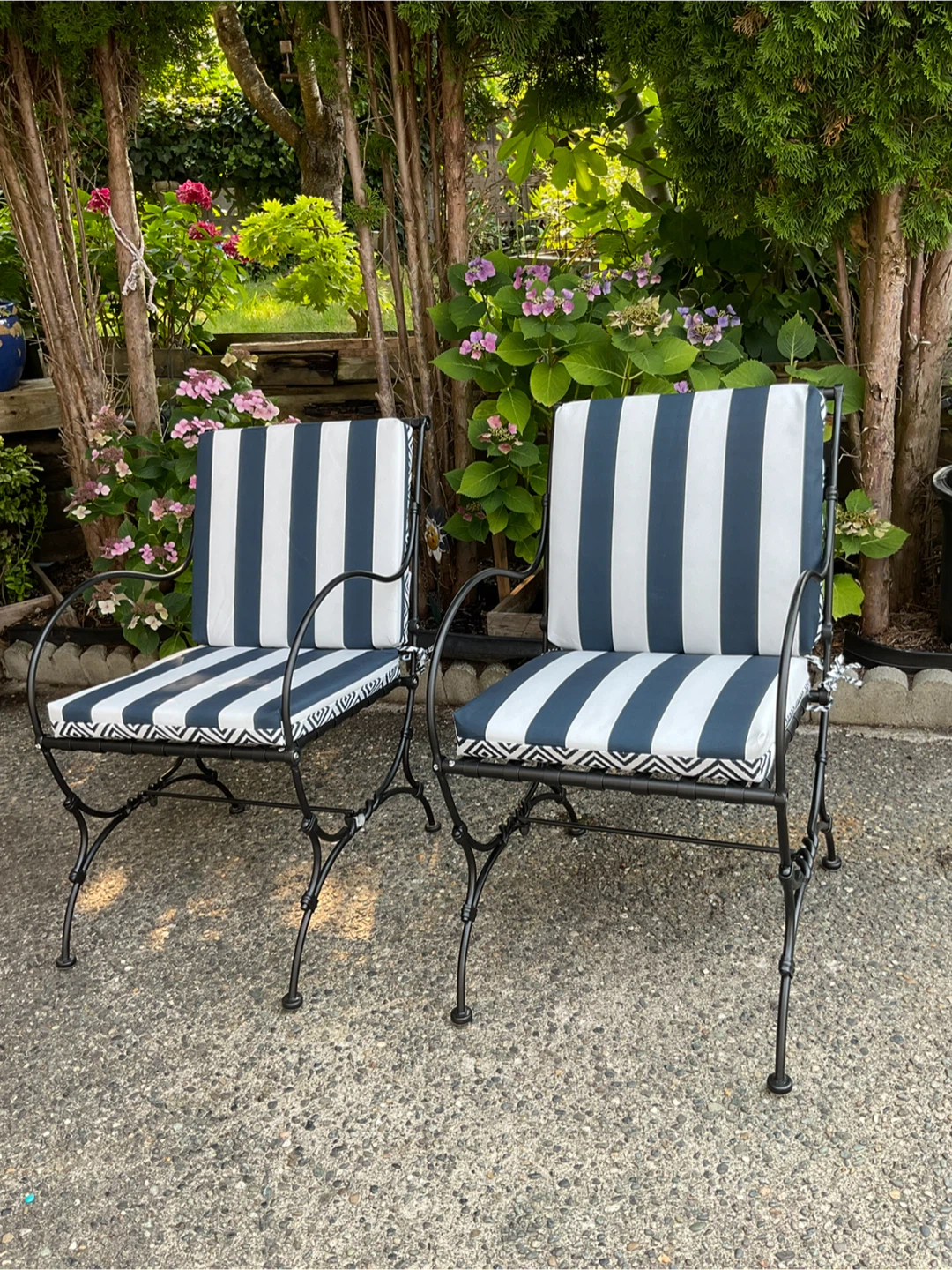 Pair of Black wrought iron Chairs with Geometric Cushions
