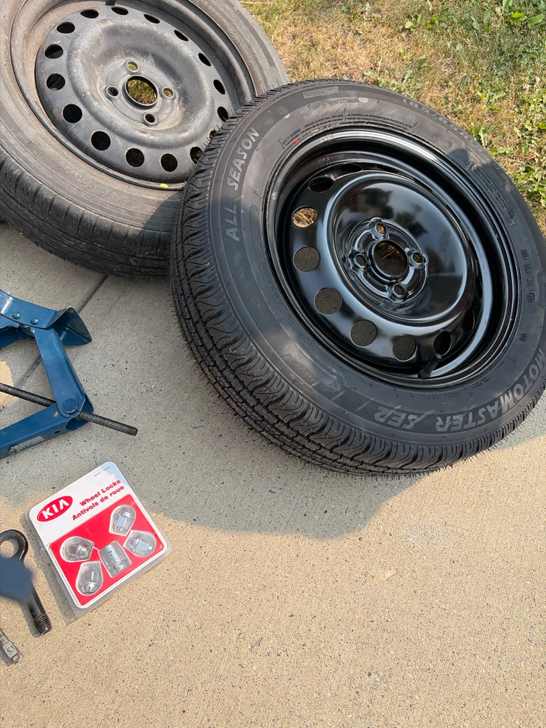 Set of 5 Tires with Jack and Wheel Locks ,    One new tire - photo 2