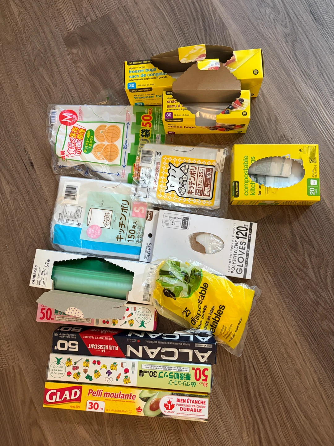 Assorted Kitchen Bags, Gloves, and Plastic Wrap
