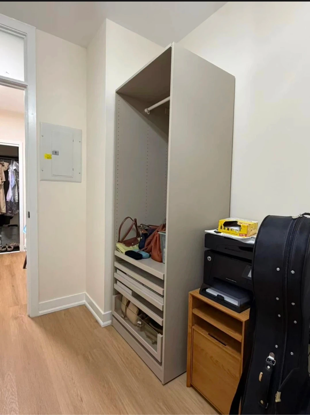 Cream coloured closet organizer with hanging rod - photo 2