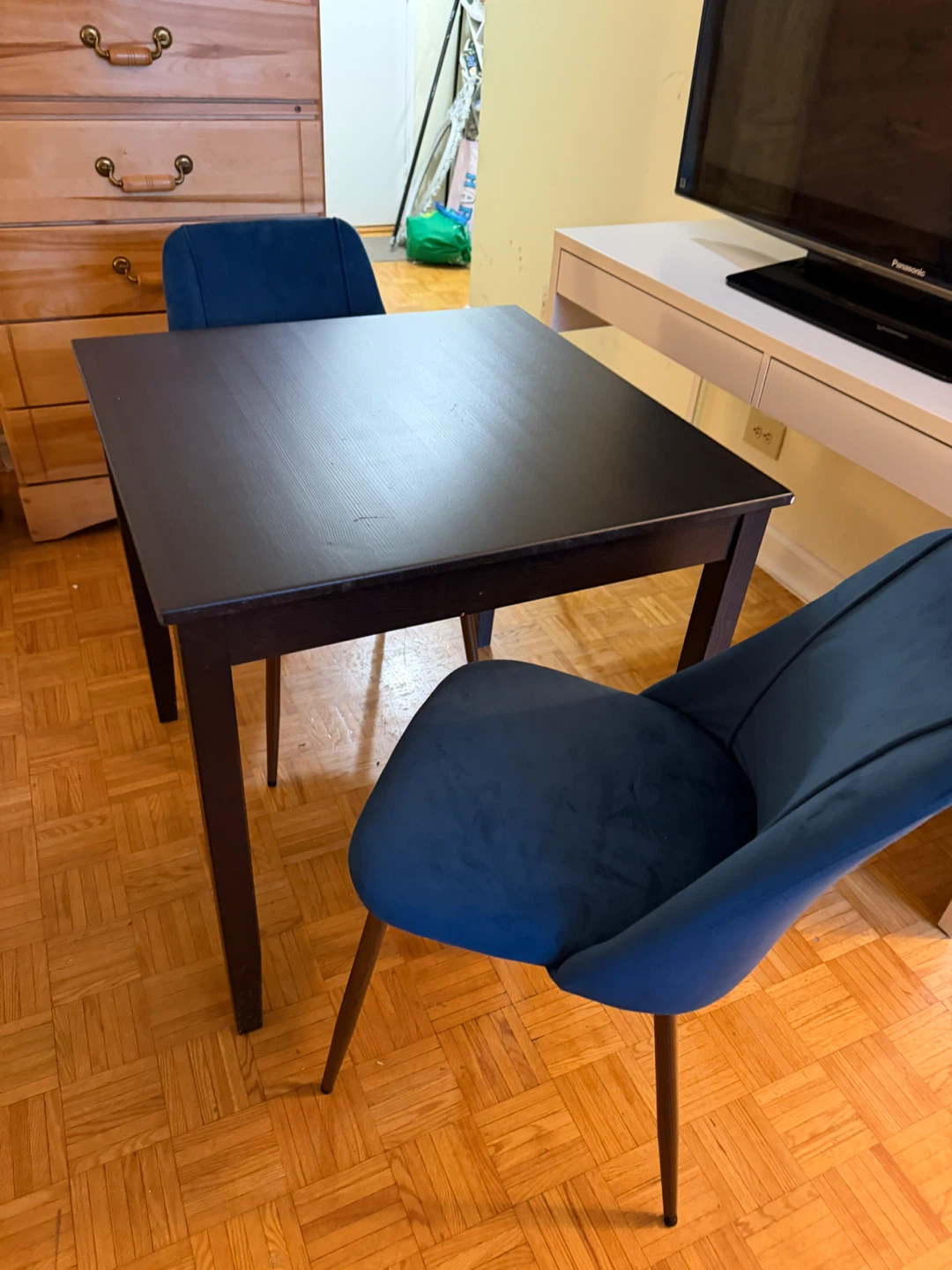 Black Square Dining Table with velvet chairs