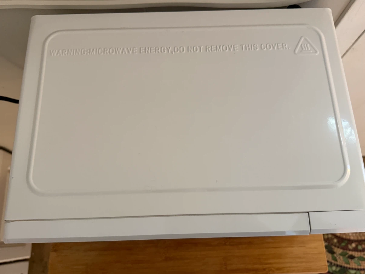 Small microwave with kid-safe option (less than a year of use) - photo 2