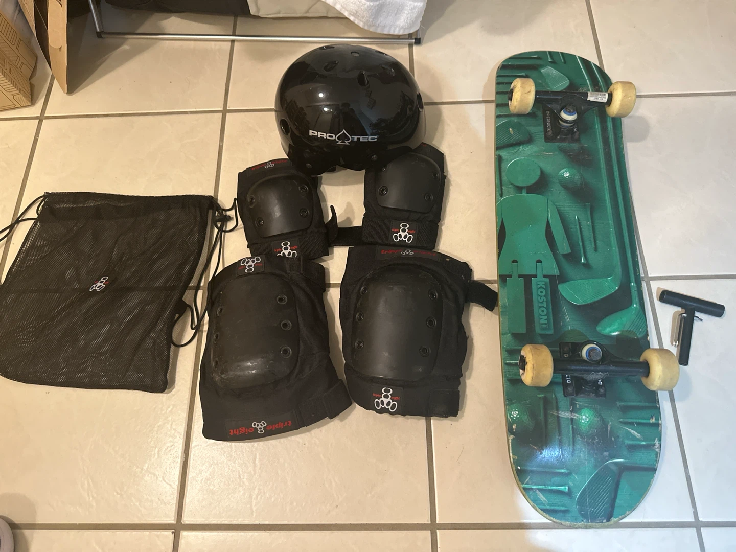 Complete Skateboard Set with Board, Helmet, Pads, and Tool