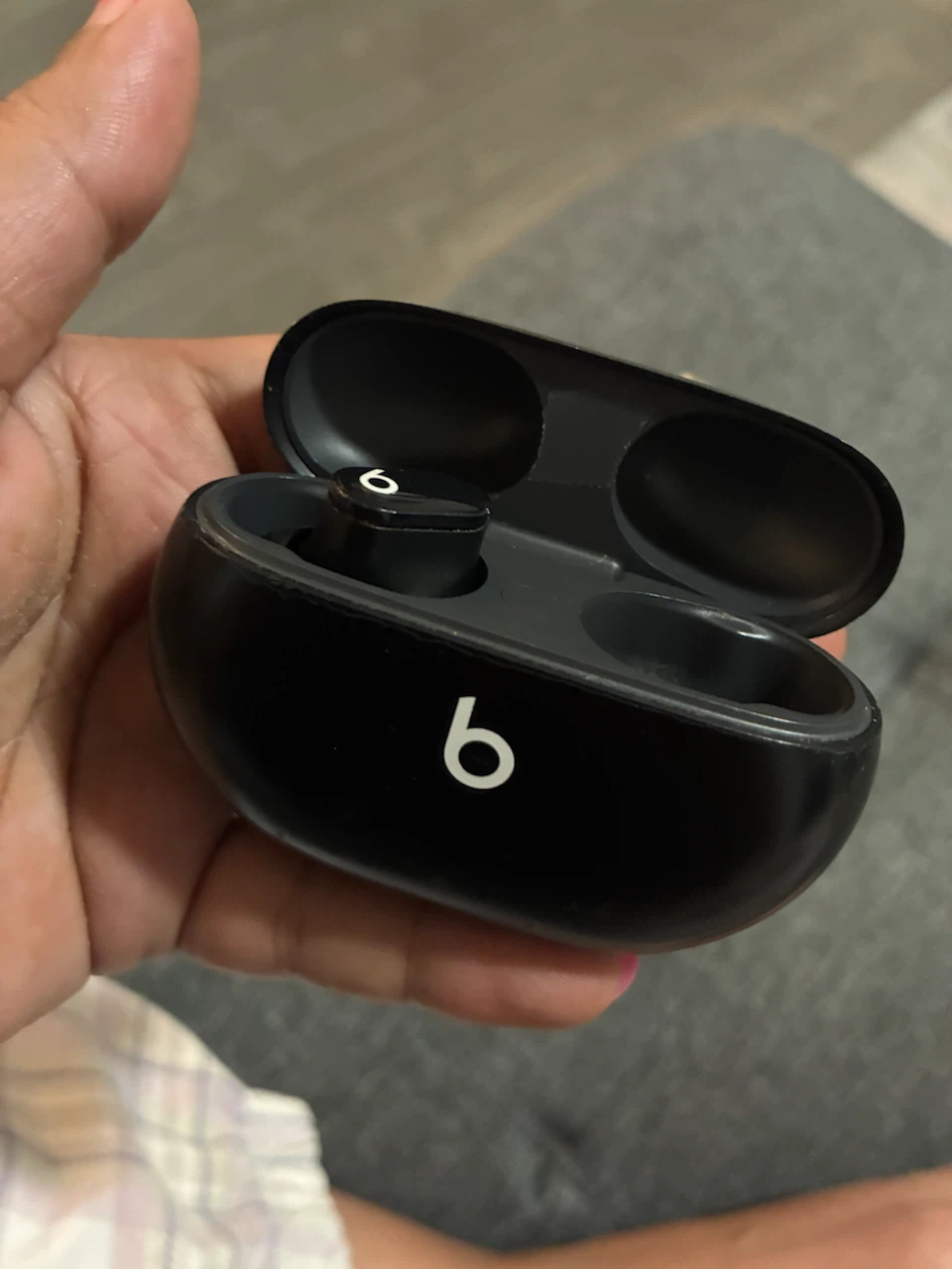 Beats Earbuds Charging Case with left earbud