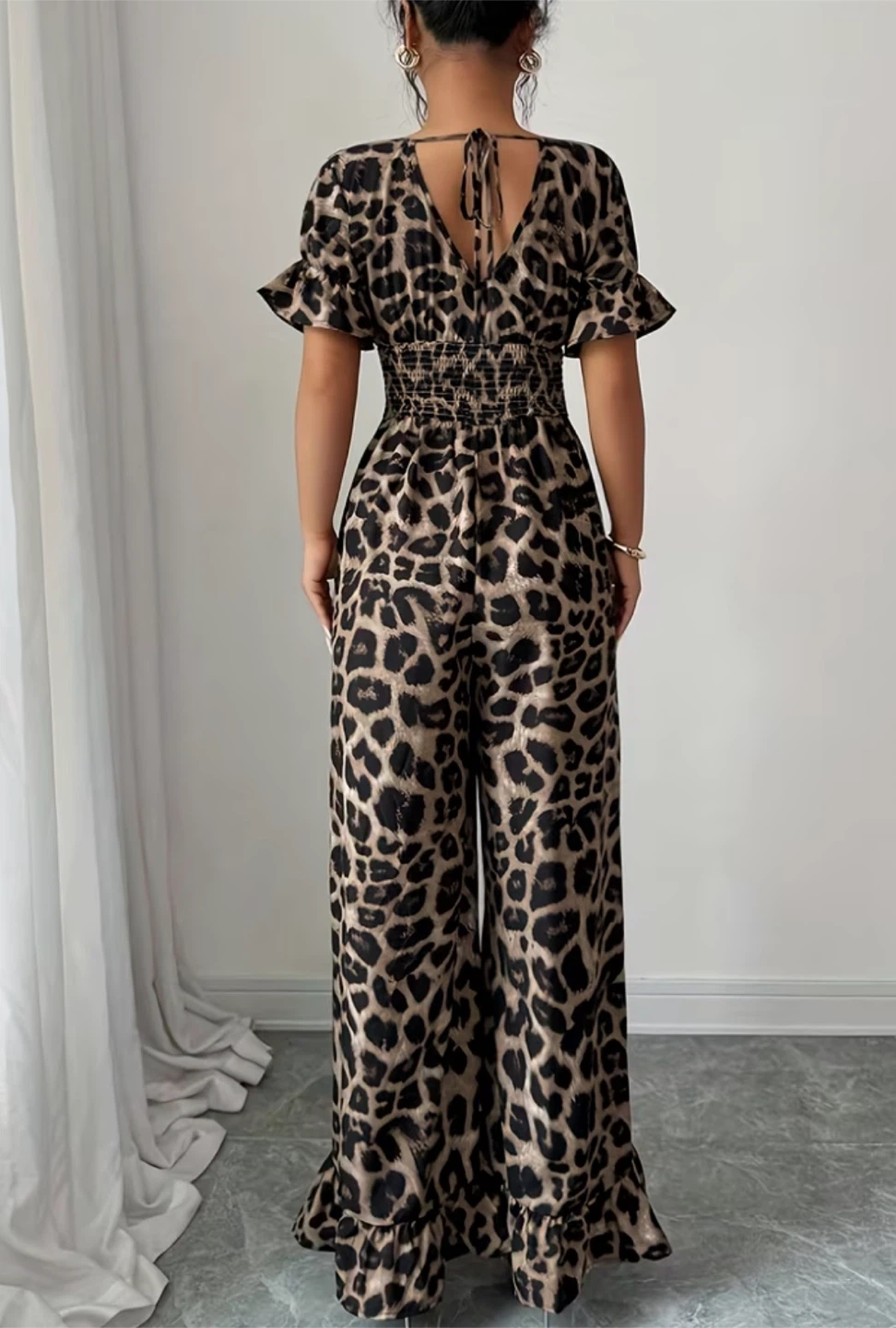 Brand new Leopard Print Jumpsuit size small - photo 2