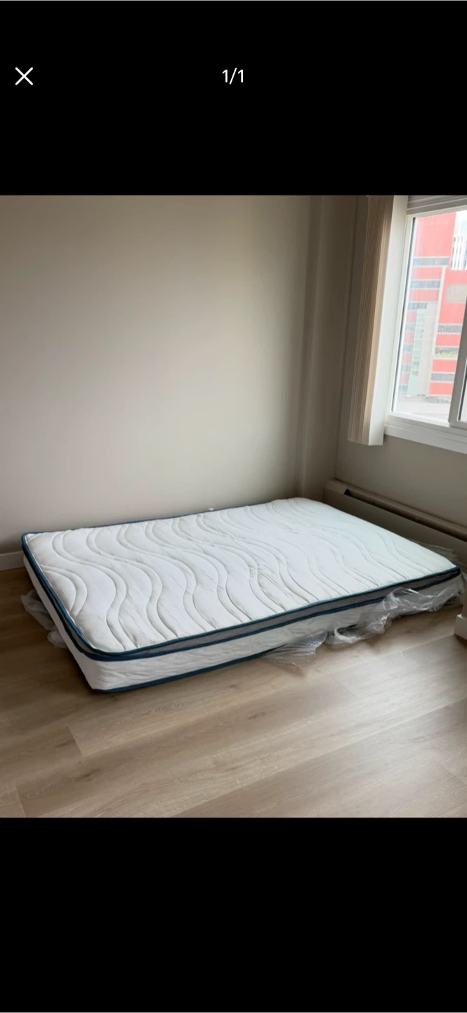 White Mattress with Blue Trim
