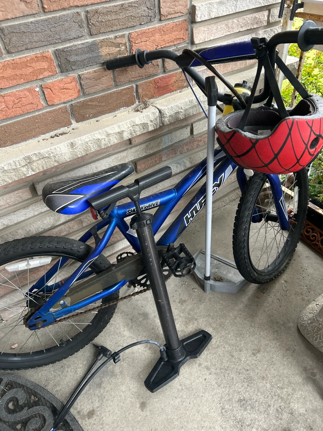 Blue Huffy "SHOCKWAVE" Bicycle with Helmet and Pump