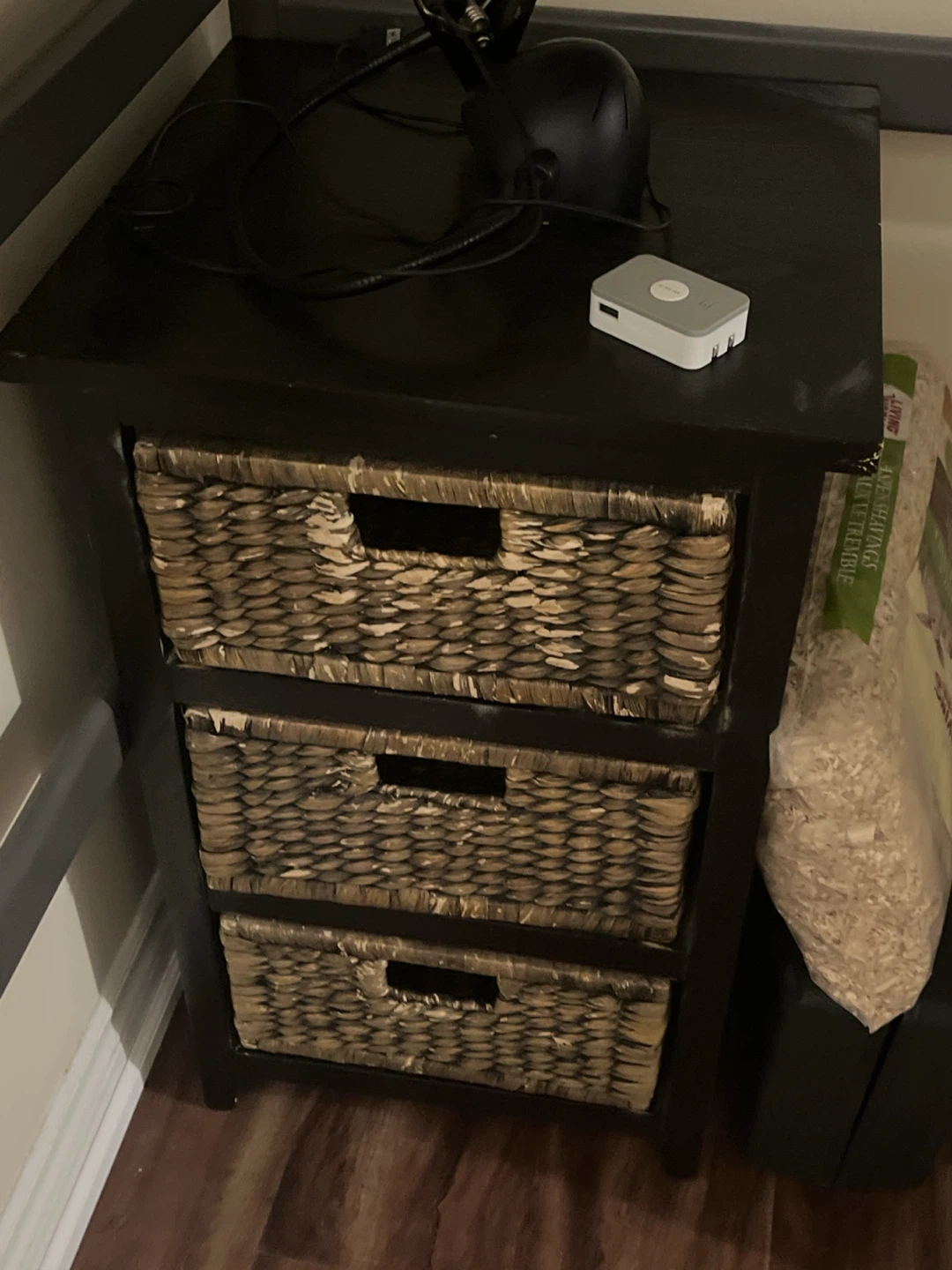 Black side table with 3 woven drawers