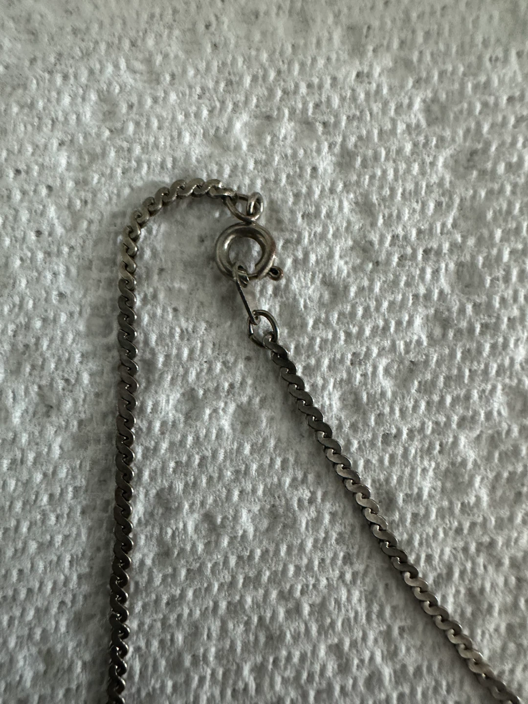 Silver tone necklace with dark stone pendant - photo 3