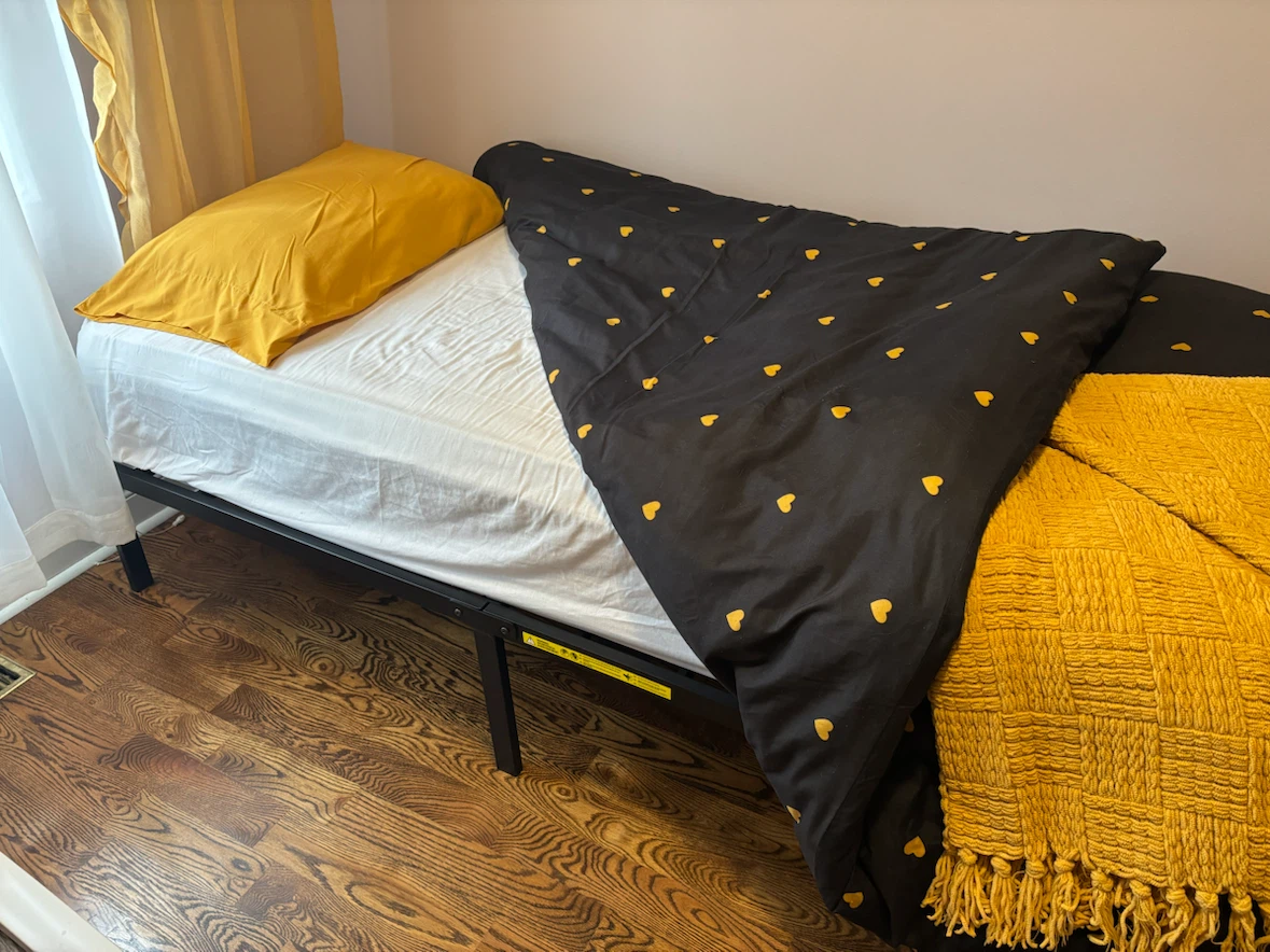 Twin foldable bed with a new mattress