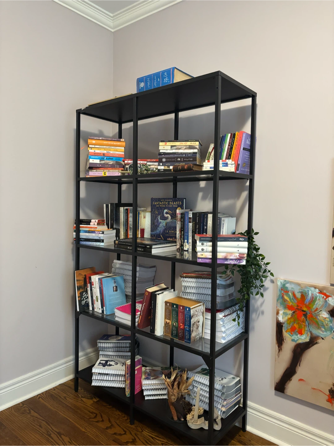 Black metal shelf with a table