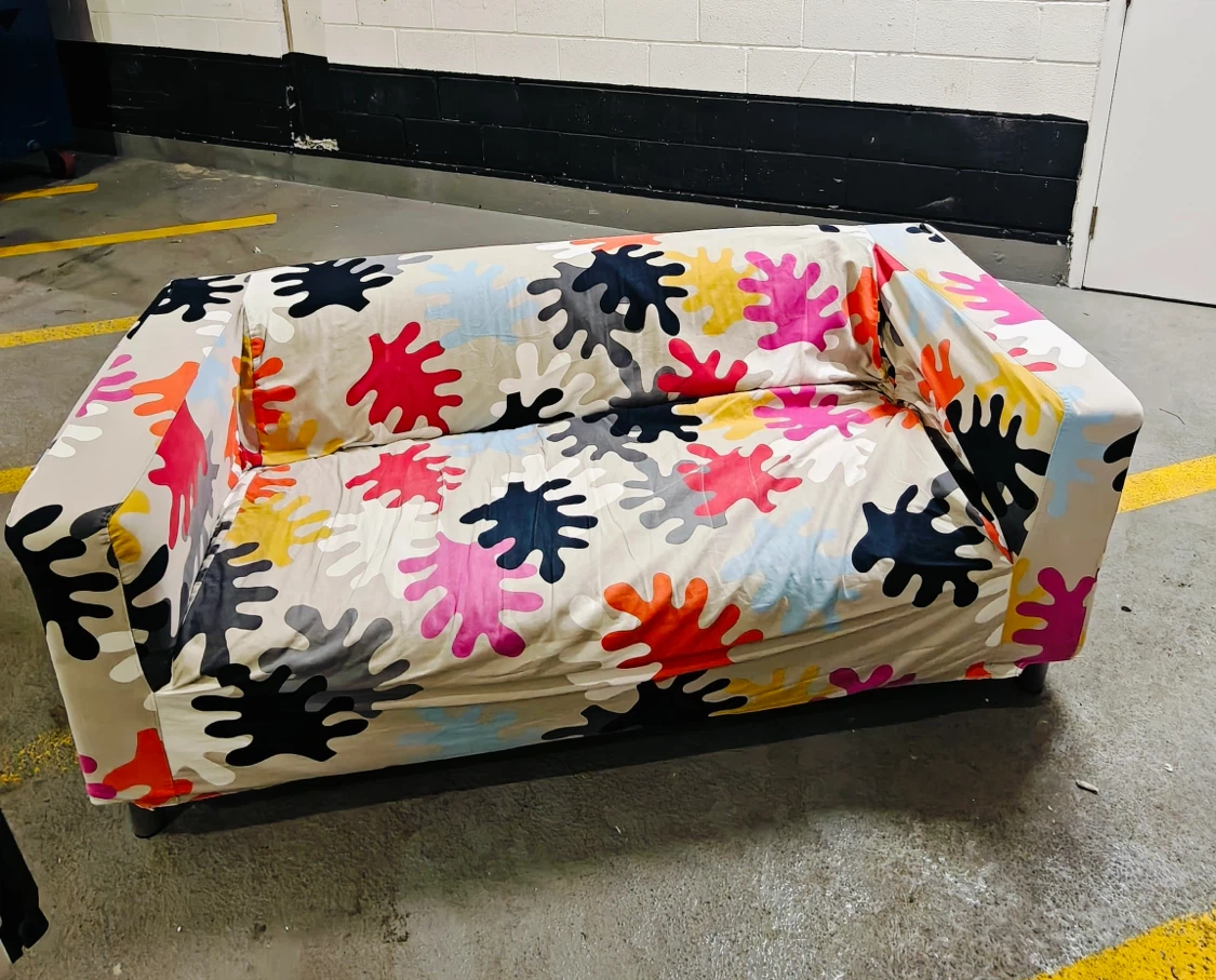 IKEA Sofa with Abstract Splatter Cover