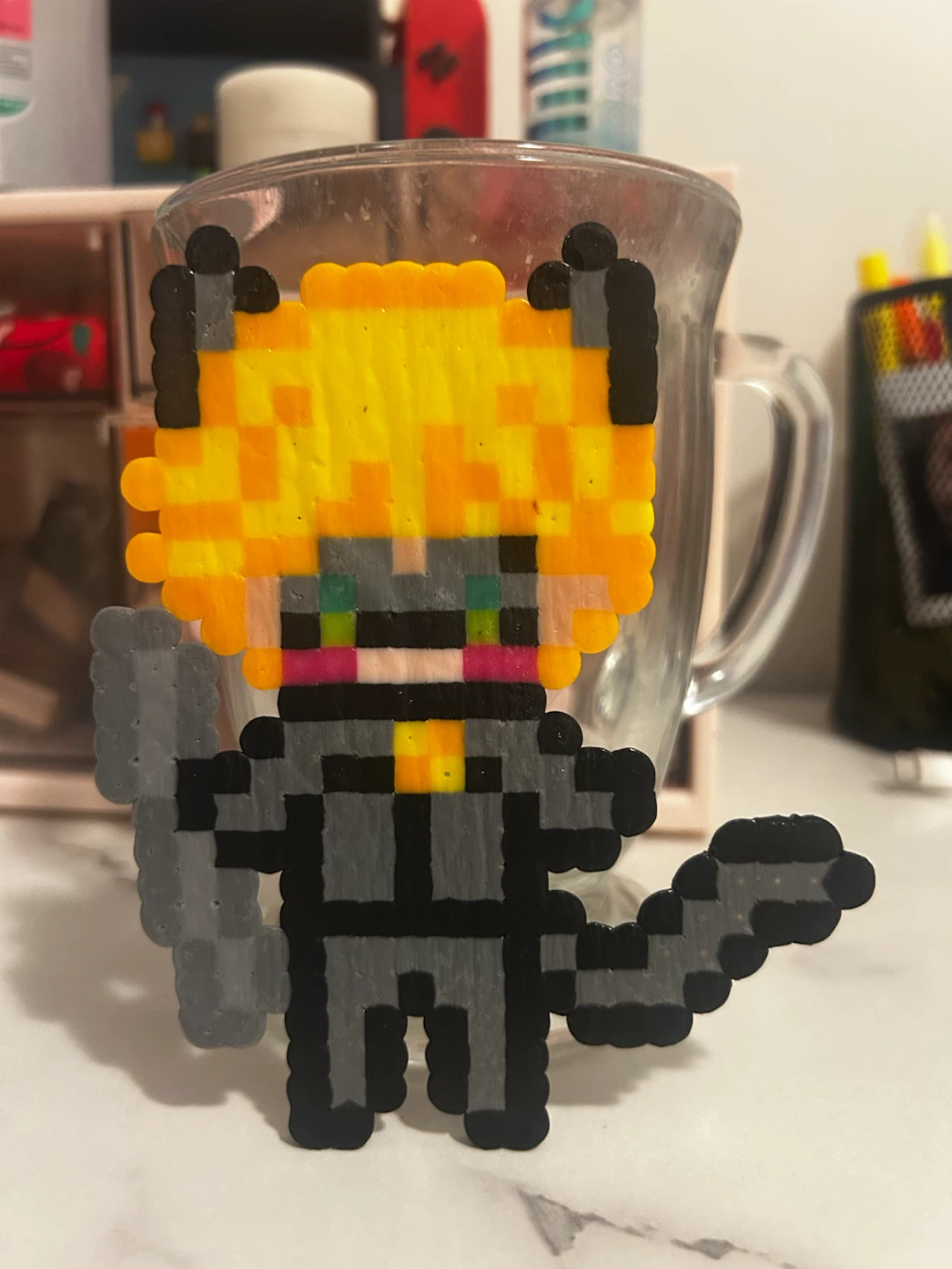 Perler bead figure of Chat Noir