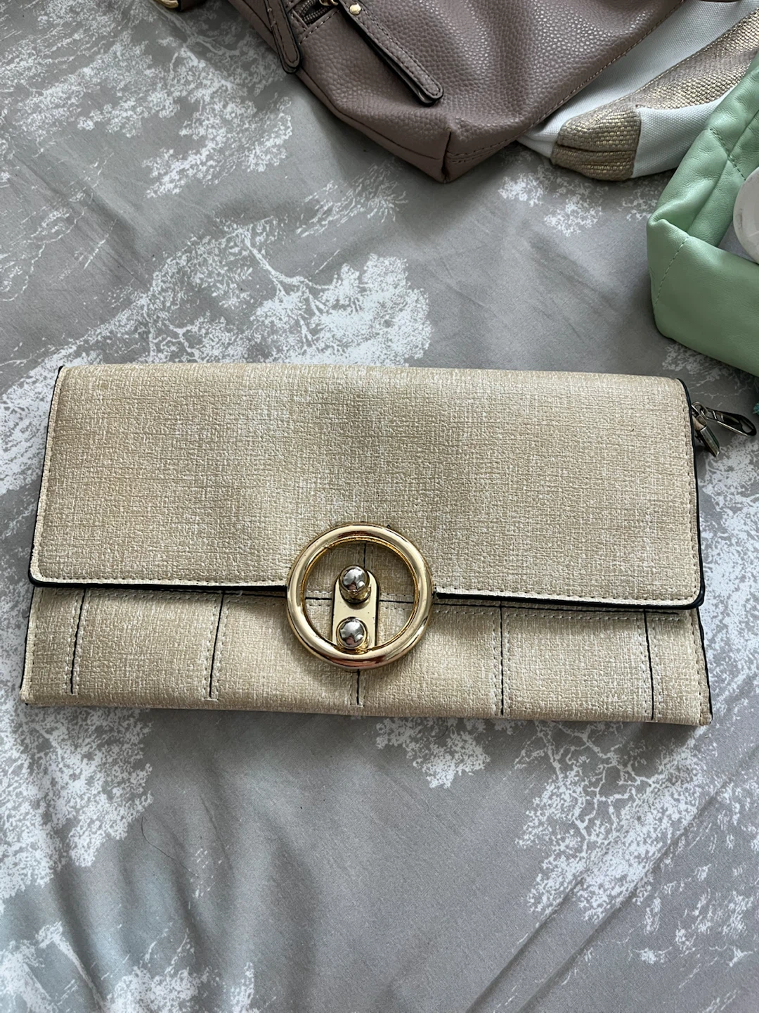 Beige Clutch Purse with Gold Ring Closure