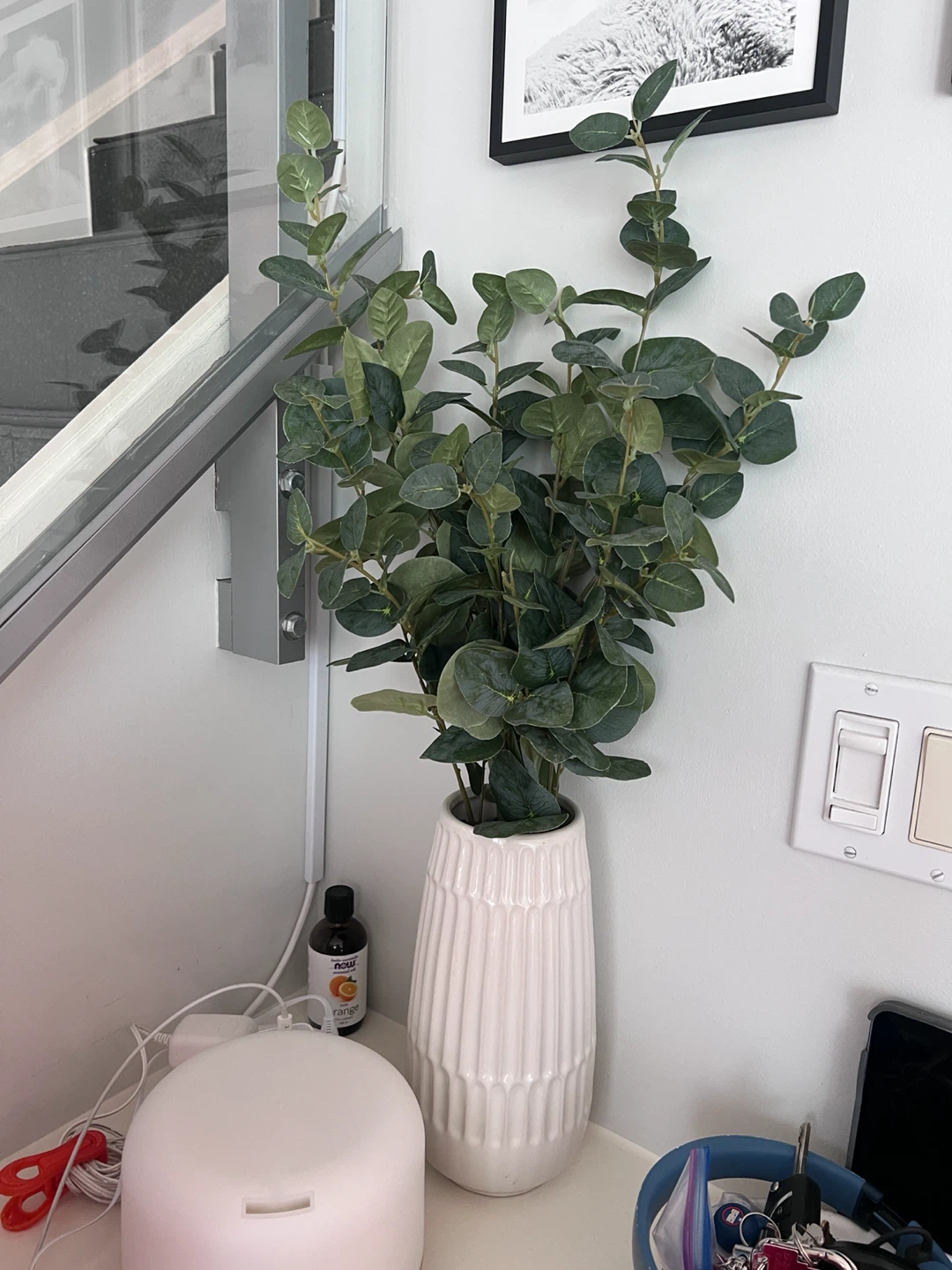 Artificial Eucalyptus Stems in White Ceramic Vase
