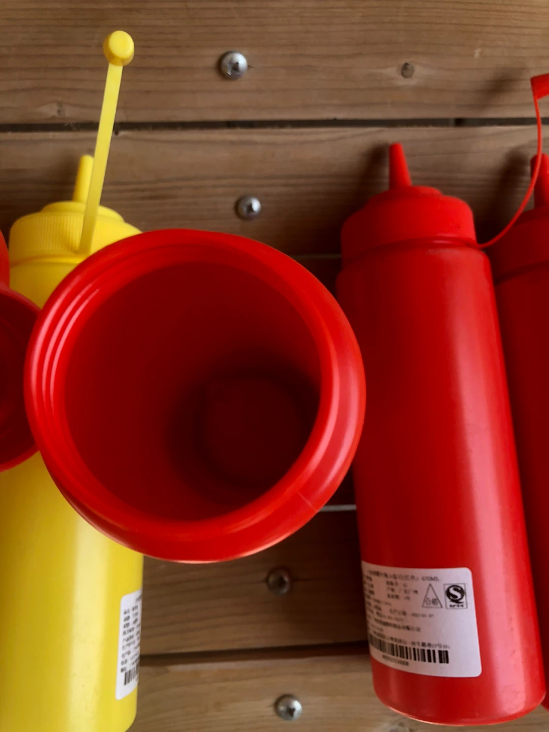 Set of Red and Yellow Squeeze Bottles - photo 2