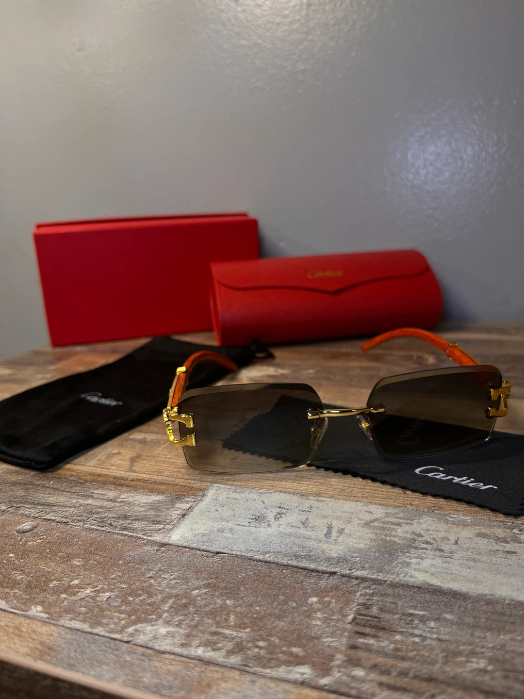 Cartier Rimless Sunglasses with Red Temple Accents