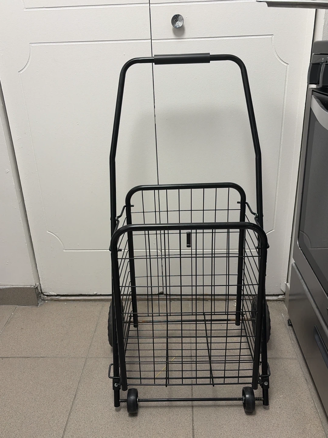 Black Metal Rolling Shopping Cart