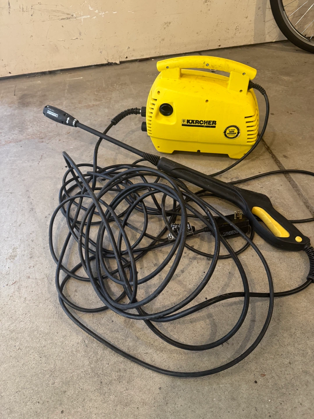 Karcher Pressure Washer with hose and gun.