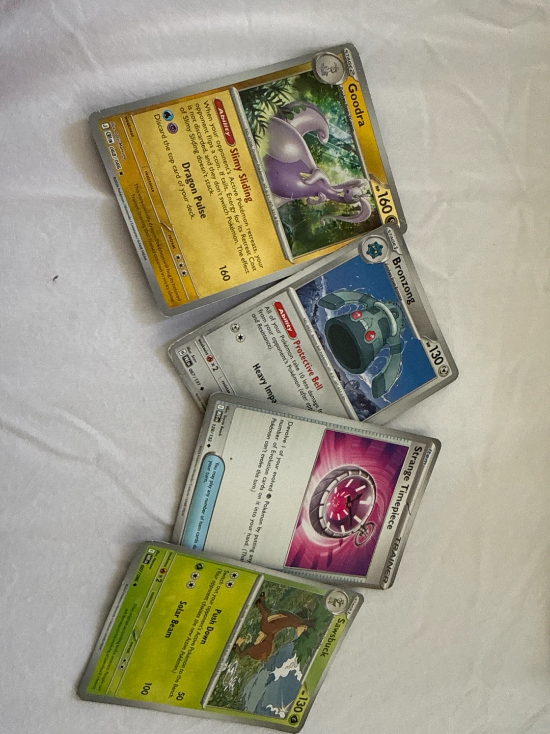 Pokemon Trading Cards: Goodra, Bronzong, Sawsbuck