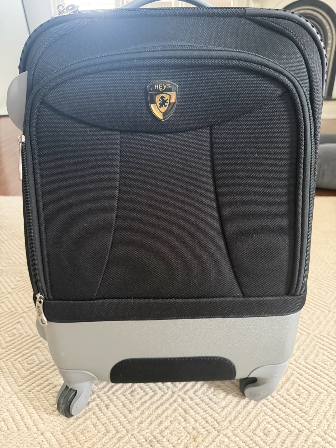 HEYS Black Rolling Suitcase- used 3 times