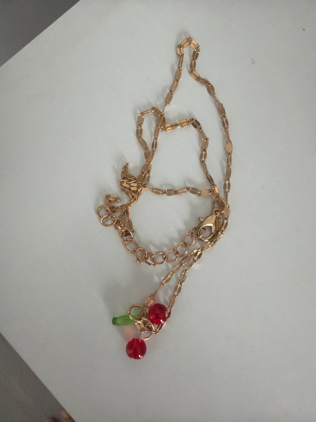 Gold-tone necklace with cherry charm
