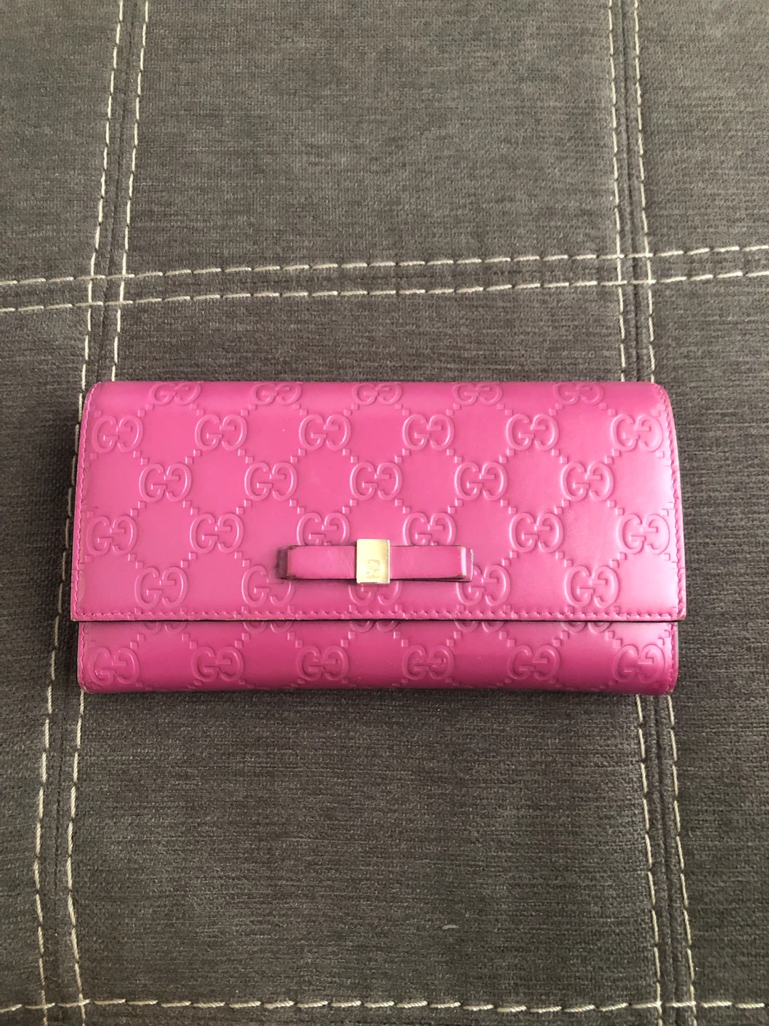 Pink Gucci Embossed Leather Wallet