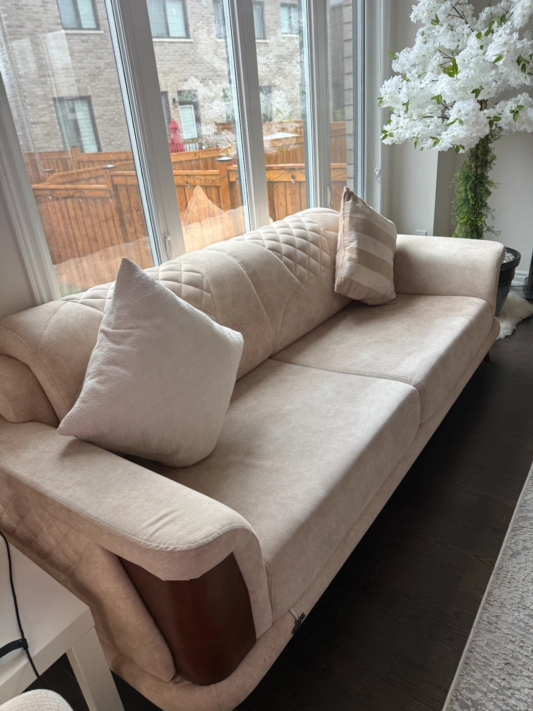 Beige Sofa with Wooden Accents