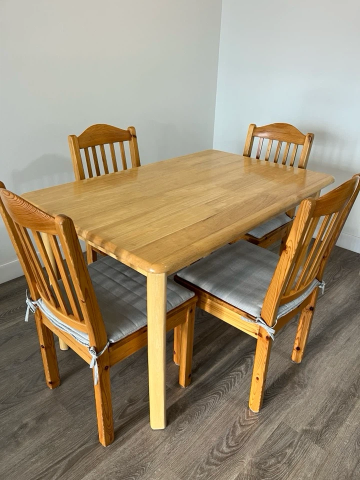table, chairs, cushions