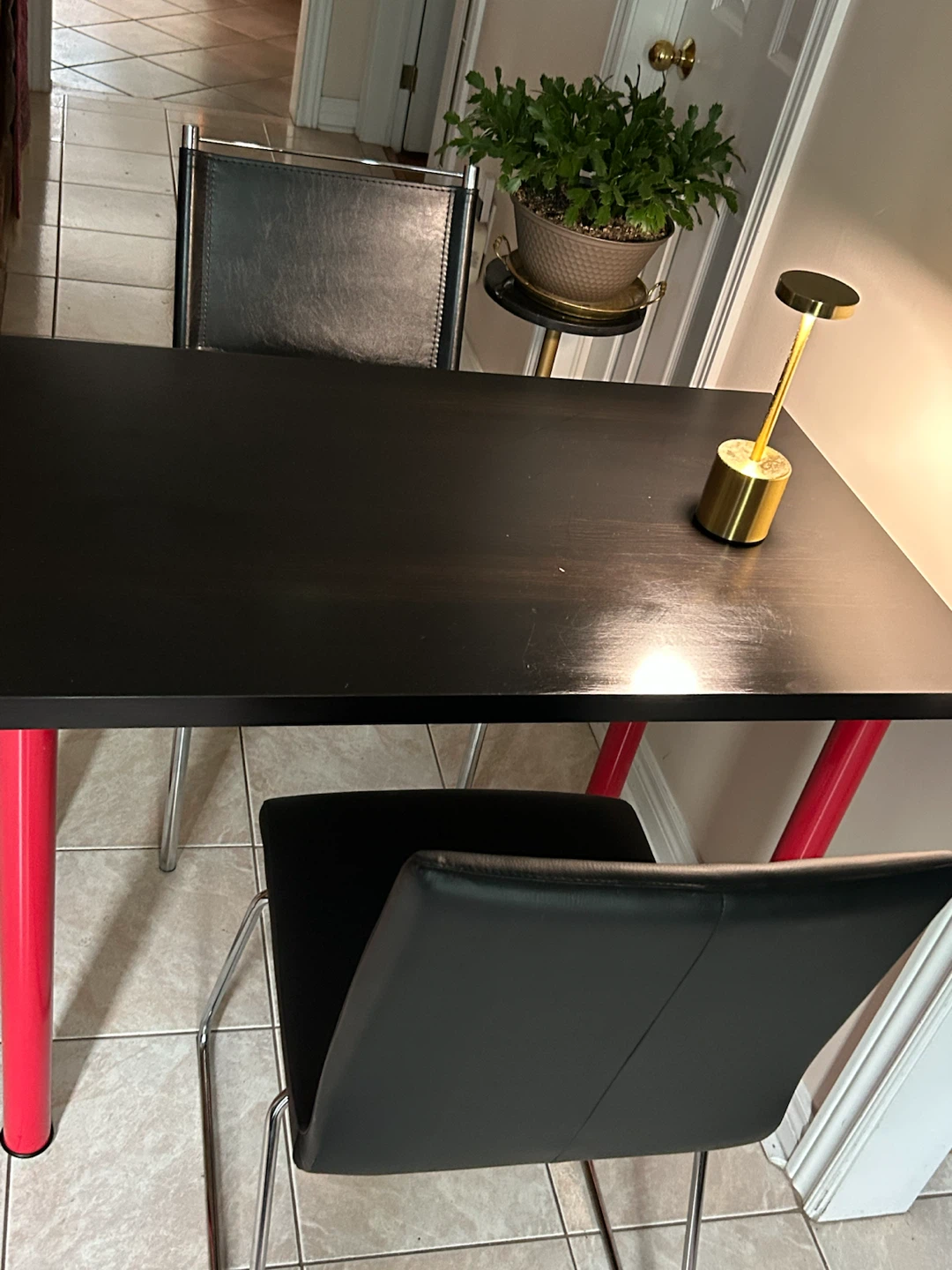 Black Dining Table with Red Legs and two moder leather chairs - photo 3