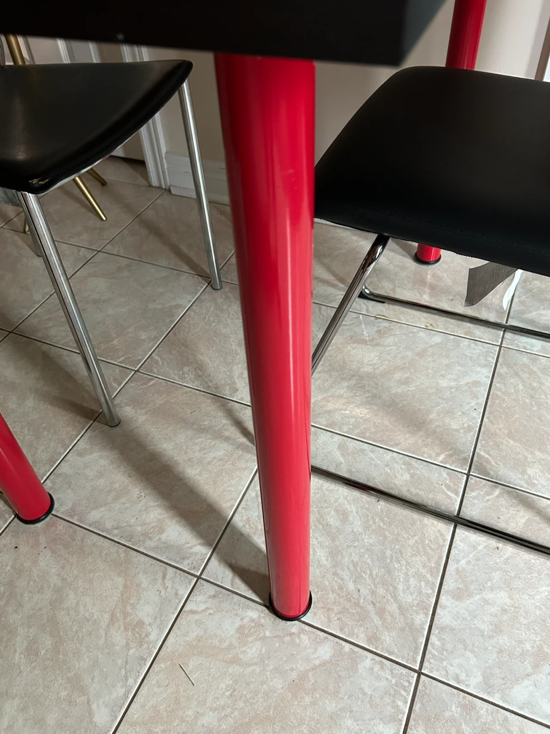 Black Dining Table with Red Legs and two moder leather chairs - photo 4