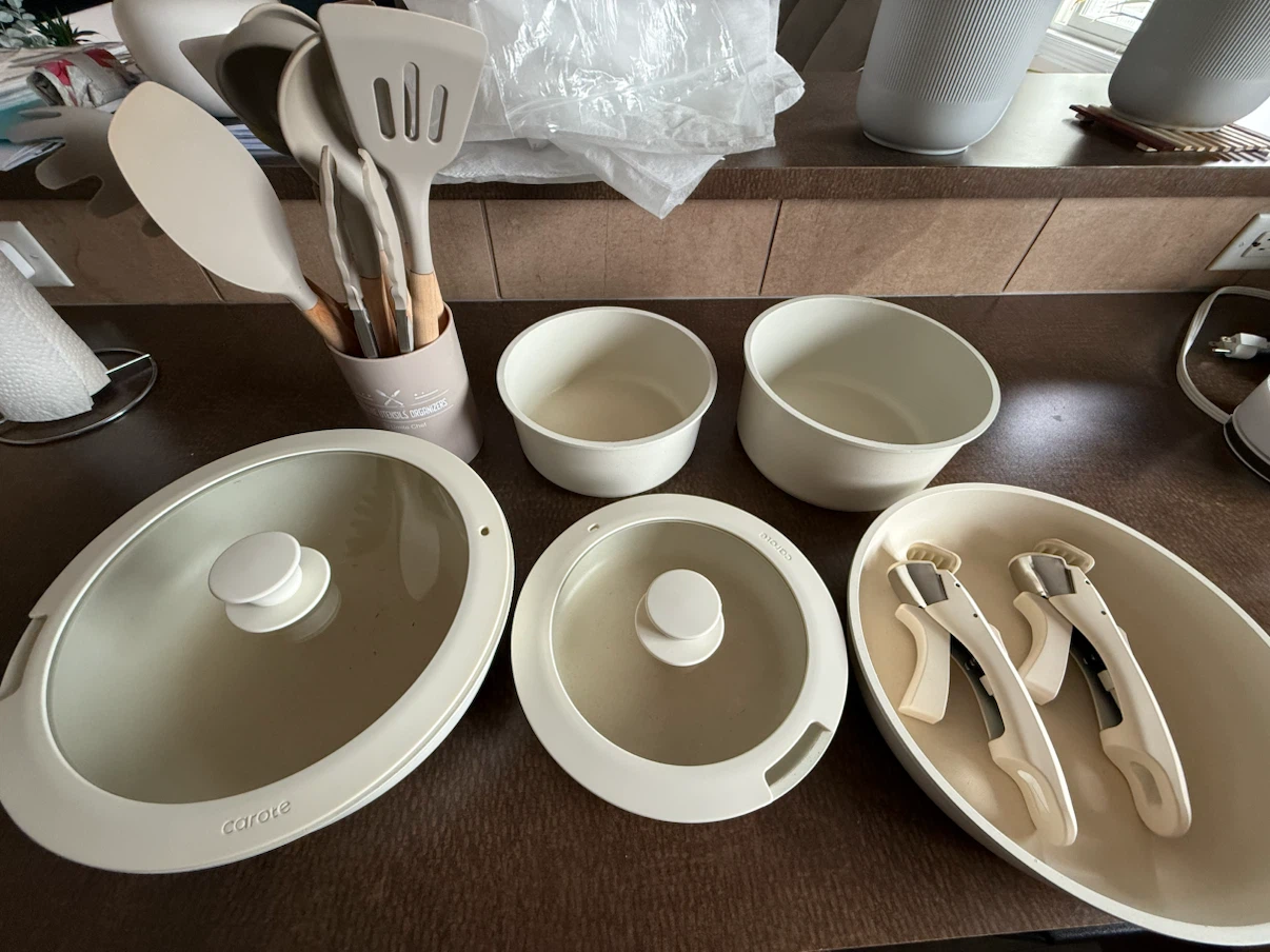 Pots and pans with utensils