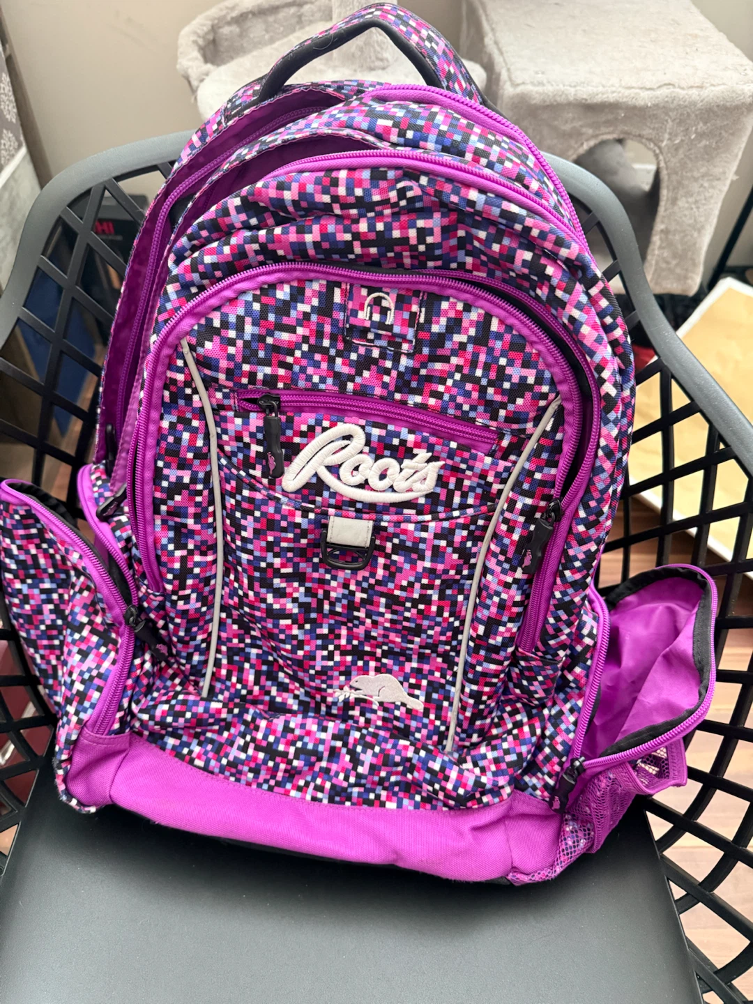 New Roots Backpack colourful pixelated design purple