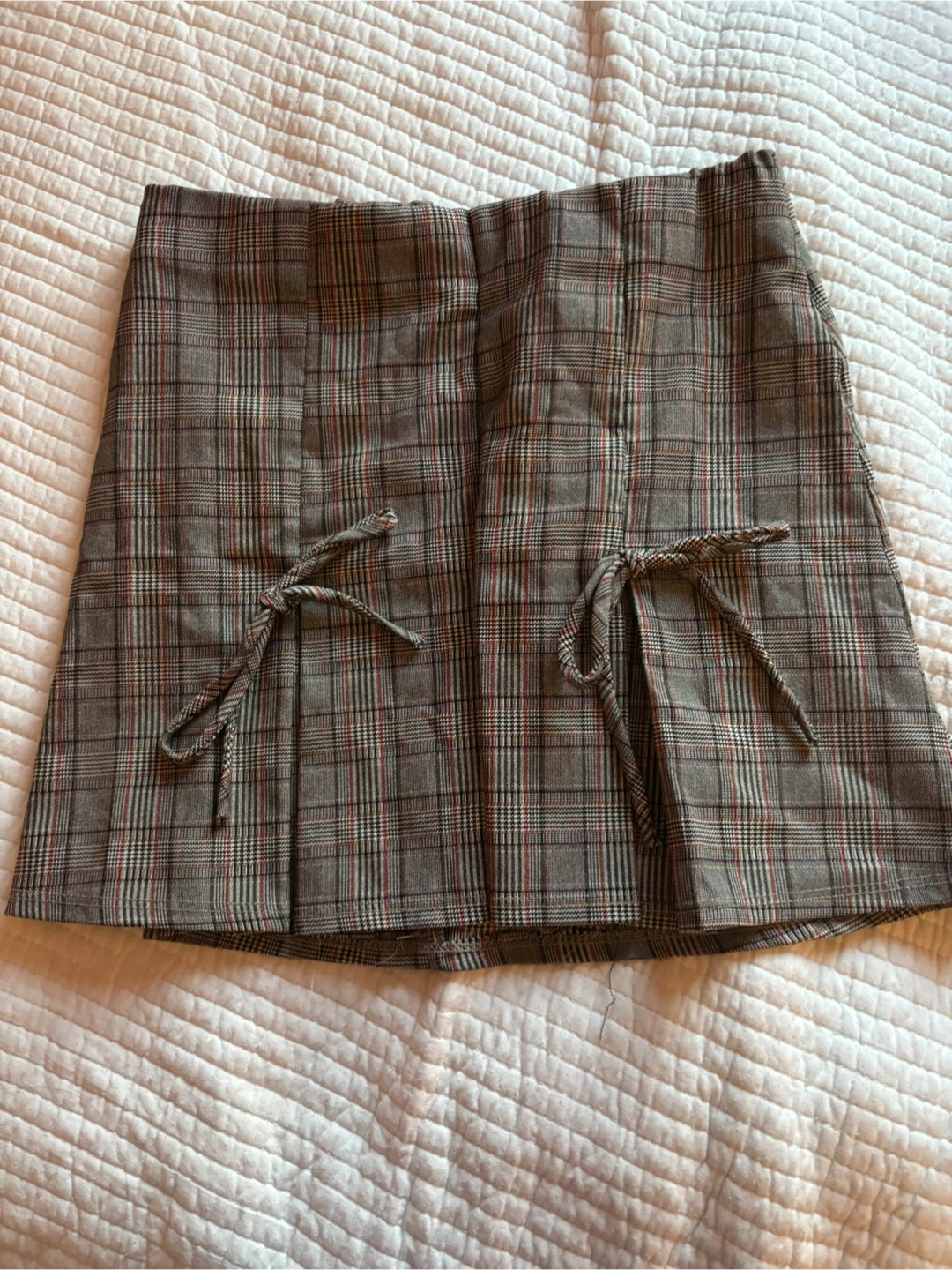Plaid mini skirt with tie details