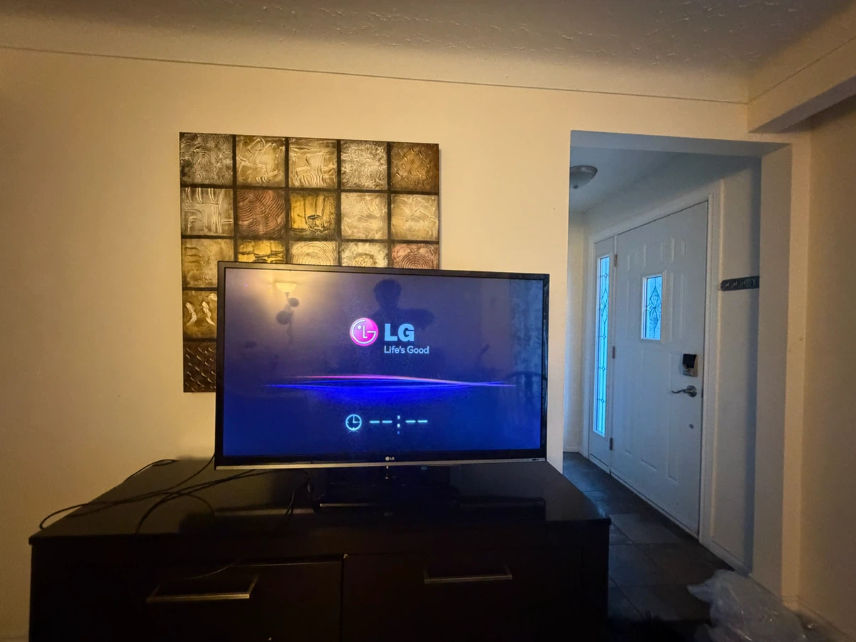 LG 50” Flat Screen TV with Remote