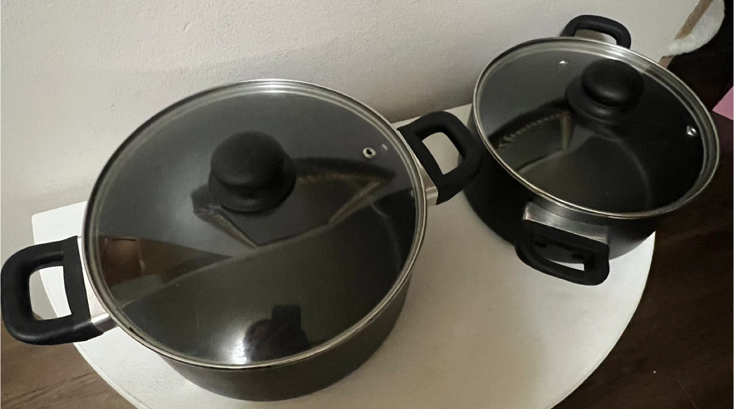 Two Black Pots with Lids