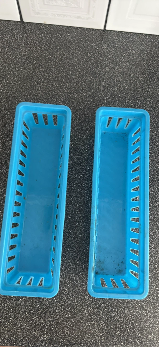 Two blue storage containers