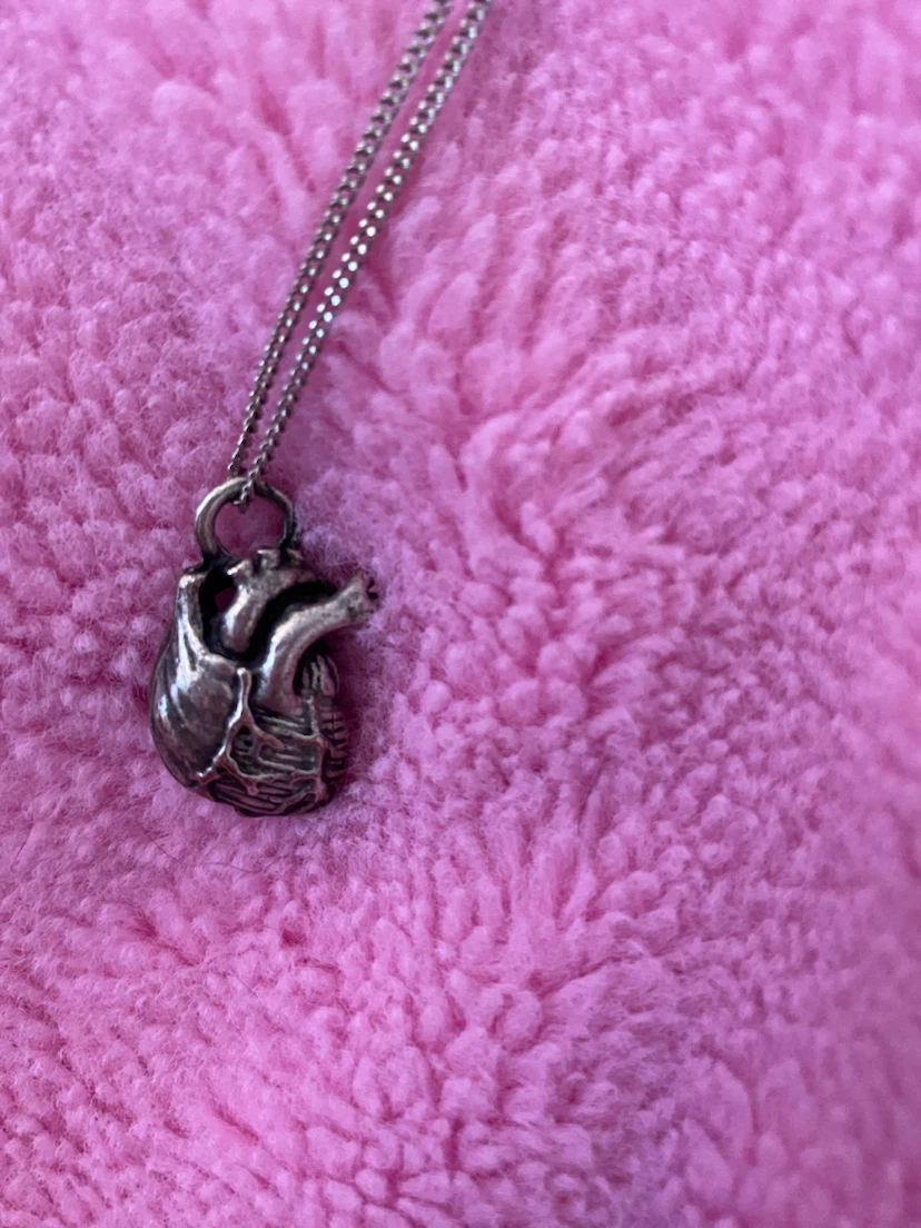 Silver anatomical heart pendant necklace